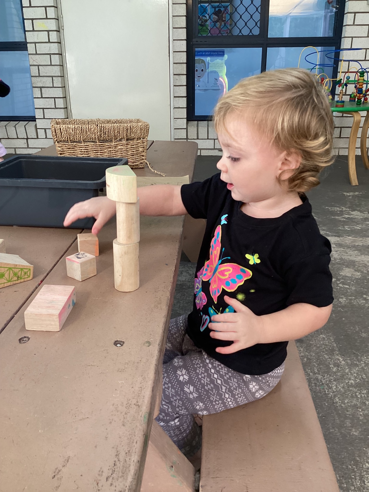 Toddler playing with blocks - Seedlings Early Learning and Childcare