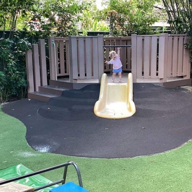 Child playing on slide - Seedlings Early Learning and Childcare